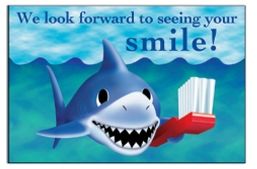 smiling shark post card with toothbrush and the phrase 